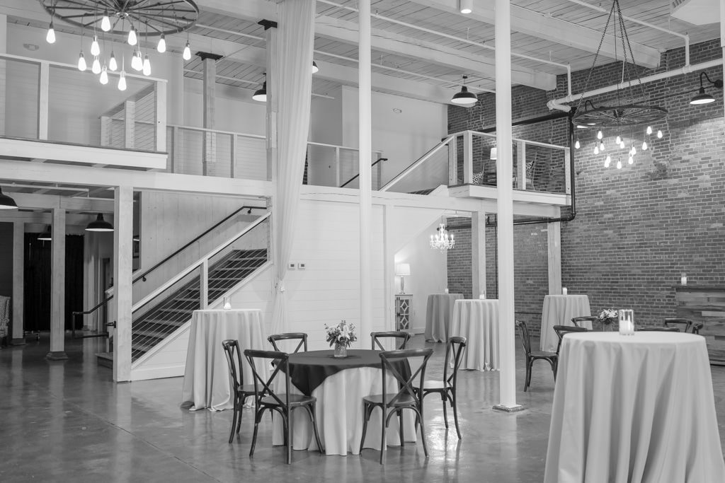Industrial loft-style cocktail space with high ceilings and exposed brick at this Georgia wedding venue.