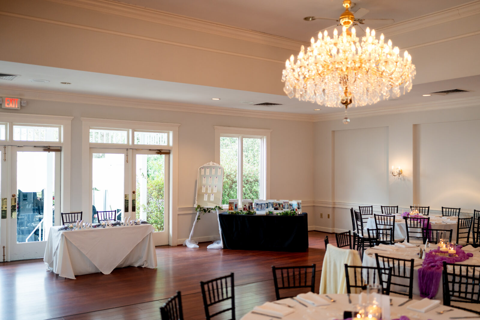 Spacious indoor reception setup with glowing chandelier at 173 Carlyle House in Norcross GA