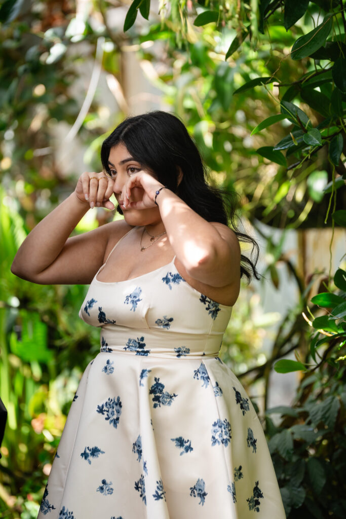 Bride wiping away happy tears after proposal in Atlanta garden setting