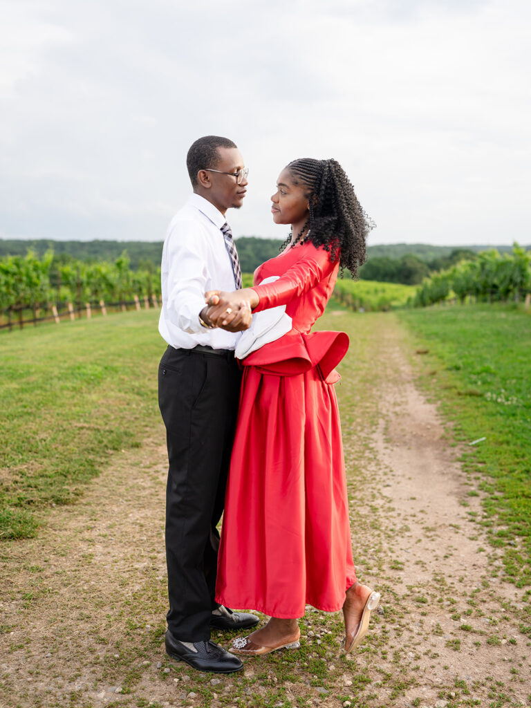 Intimate moment between couple after proposal captured by Kalyn Wolf Studios