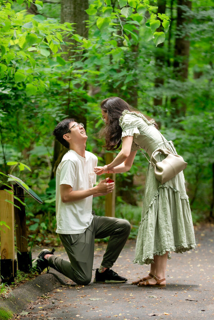 Marriage Proposal Atlanta - Kalyn Wolf Studios Couple celebrating after saying yes during their proposal packages Atlanta session.