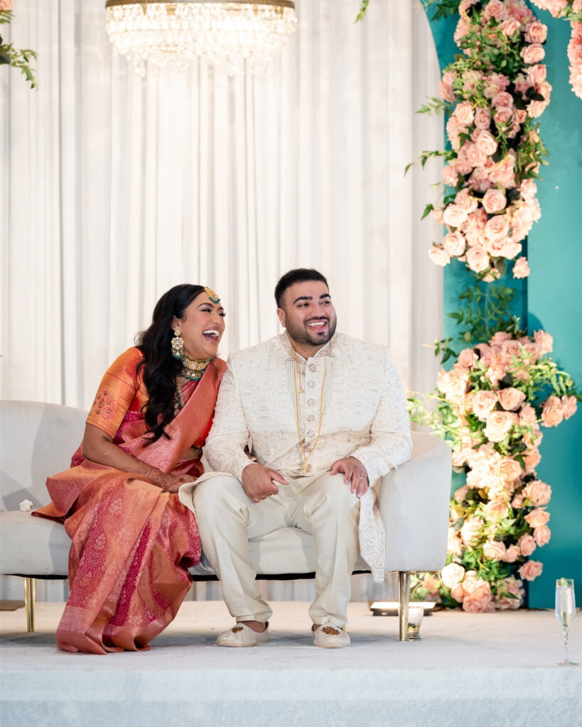 Joyful reception moments preserved by Indian wedding photographer. 