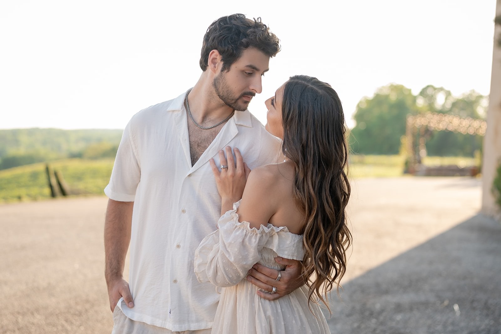 Couple staring into each other's eyes at one of the best places to take engagement photos in Atlanta.