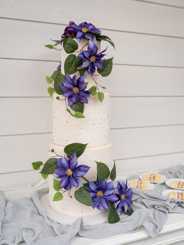 Average Cost of Wedding in Georgia | Kalyn Wolf Studios Wedding cake table with florals reflecting average wedding cost Georgia.