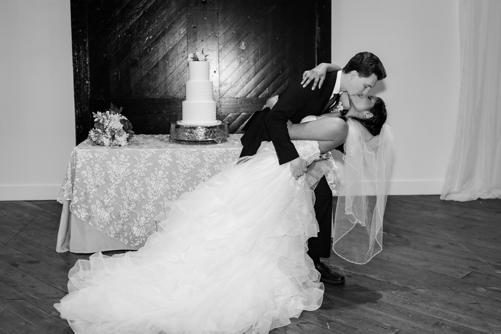 Husband dances with his wife at their reception after getting married in Georgia 