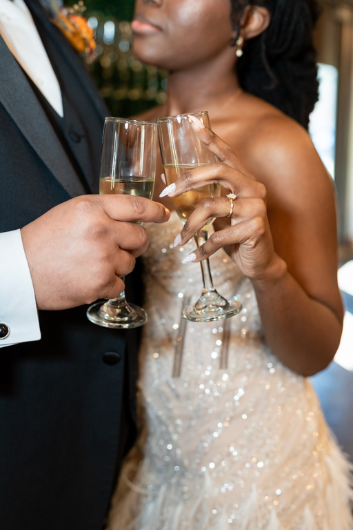 Bride and groom give a toast for knowing how to get married in Georgia