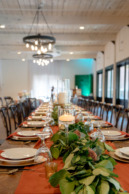 A beautiful table set for guests at a wedding venue for how to get married in Georgia