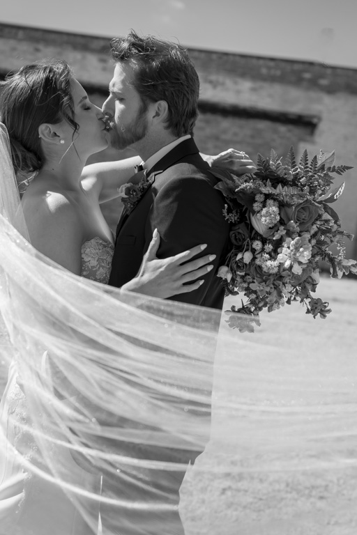 Wedding Photography Services in Georgia | Kalyn Wolf Studios Bride and groom sharing a veil portrait as part of their wedding photography services in Georgia.