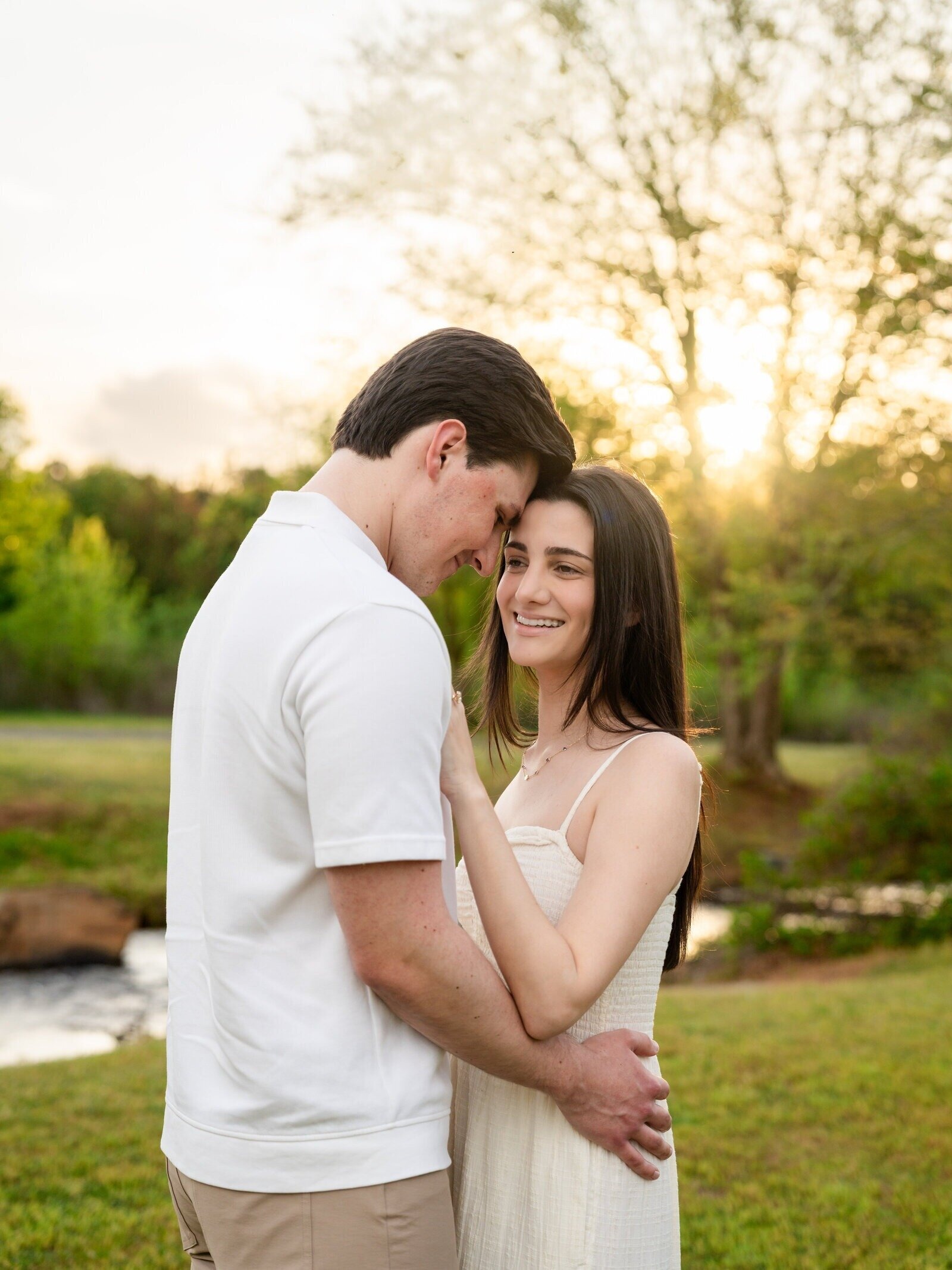 Couple smiling together during an engagement photoshoot in Georgia