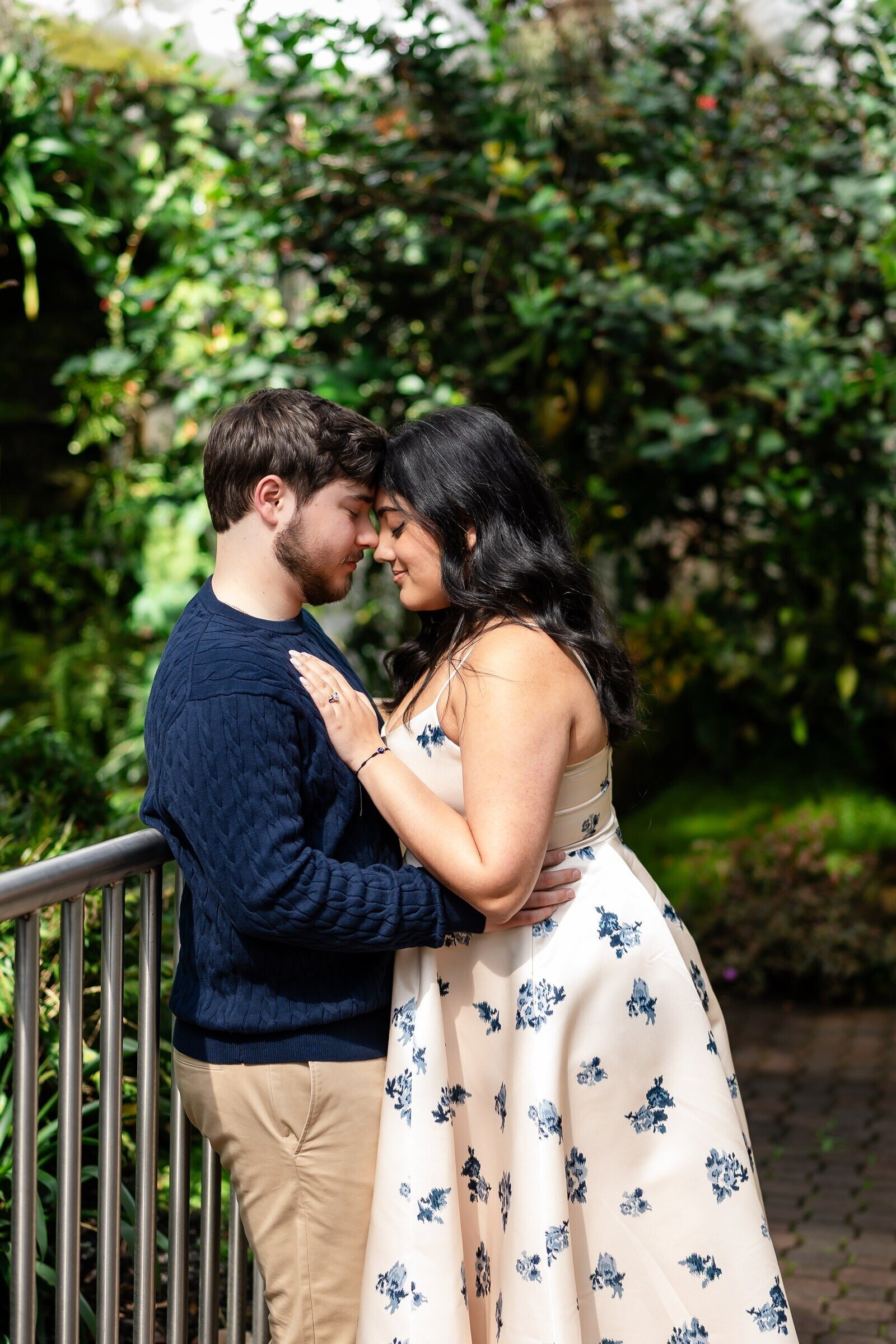 Couple embracing during their Georgia engagement photoshoot