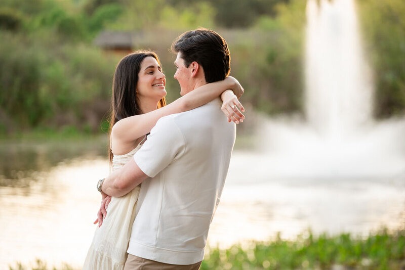 Couple enjoying a romantic engagement photo session in North Georgia.